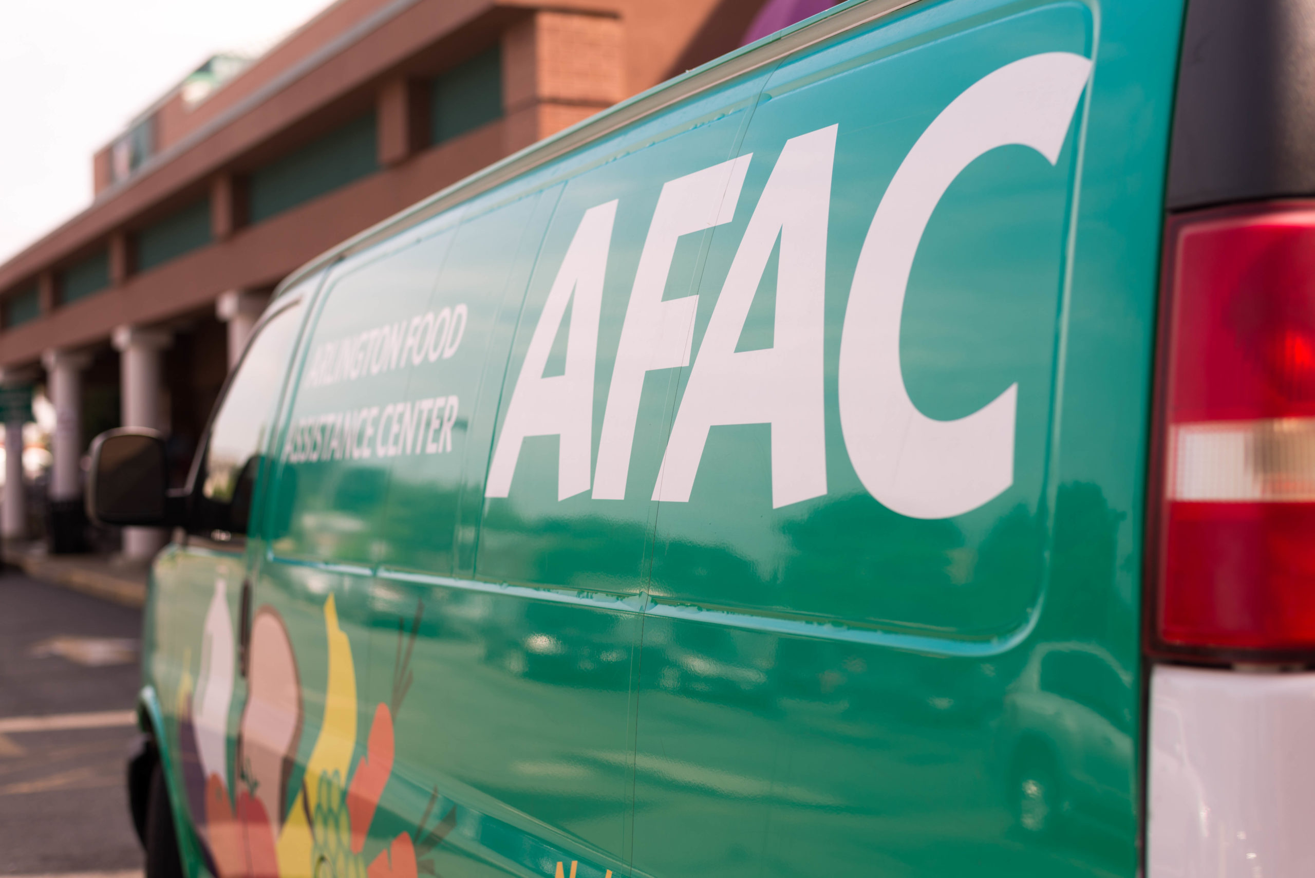 Green cargo van with AFAC's name & logo